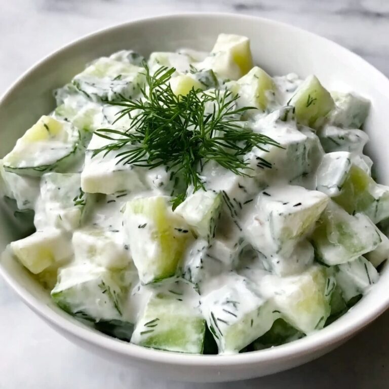 Refreshing and Tangy German Cucumber Salad with Creamy Dill Dressing Recipe