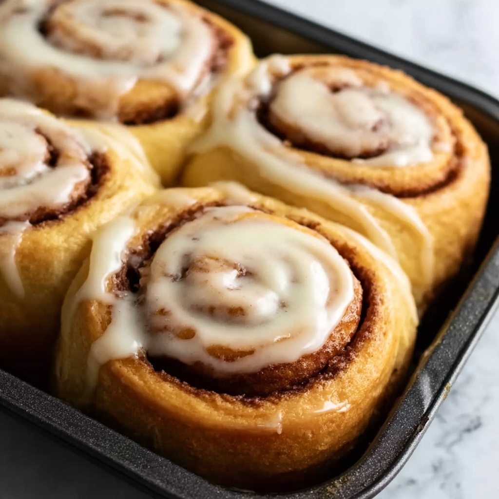 Banana Bread Cinnamon Rolls with Cream Cheese Icing Recipe - Recipe Image